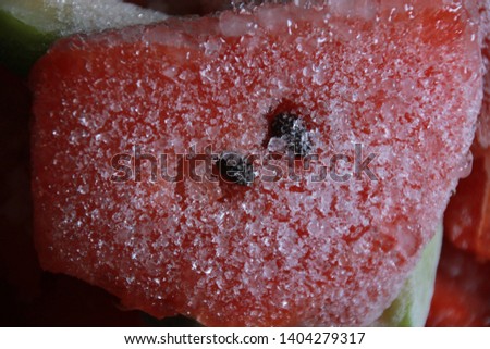 Frozen watermelon, fresh frozen fruit for a cool summer concept.