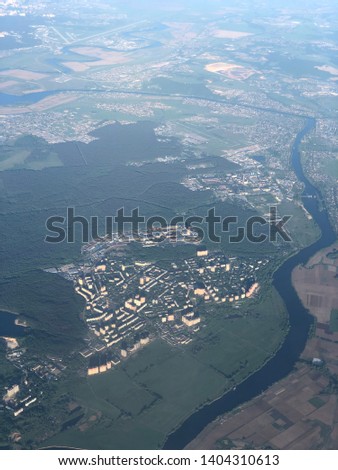 Fluffy cloud in a blue sky or Aerial view or the bird eye view of Moscow and st. petersburg Cityscape. Landscape photography of the metropolitan and the capital city of Russia federation