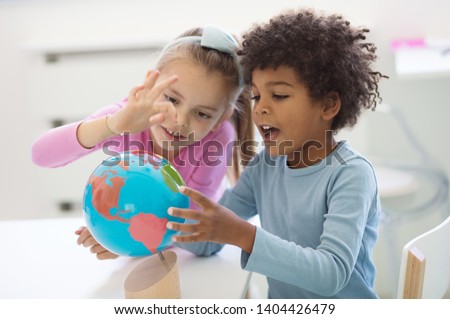 Make the world a better place. Children in preschool. Royalty-Free Stock Photo #1404426479