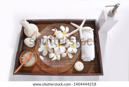 Spa bath products in wooden basket 
