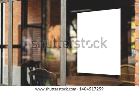 White paper poster mockup displayed outside the building restaurant. Marketing and business concept.  Royalty-Free Stock Photo #1404517259
