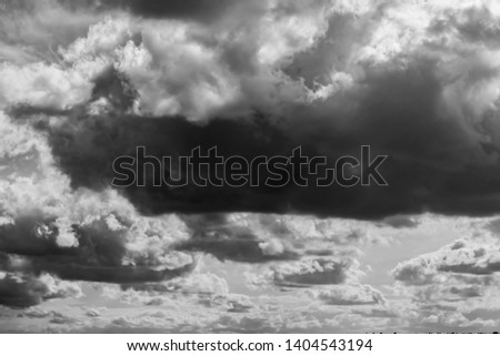 clouds in the dark sky, rain clouds, monochrome background