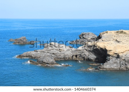View of the cliffs of Cabo de Palos at the tip of the Manga del Mar Menor in Murcia, in the Mediterranean Sea, spain, Photo with space for advertising,