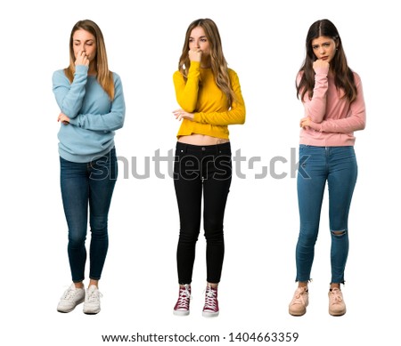 A full-length shot of a group of people with colorful clothes having doubts on isolated white background on isolated white background