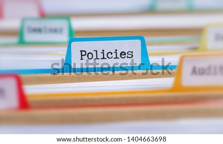 File folders with a tab labeled Policies Royalty-Free Stock Photo #1404663698