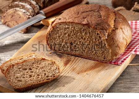 Whole Wheat Bread on cutting board.