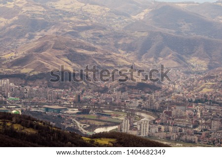 Industrial poor Balkan city , city with dirty river in center,City photographed with drone from hill near by, Zenica- Bosnia and Herzegovina,