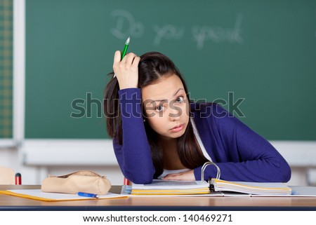 unhappy female student having stress at school