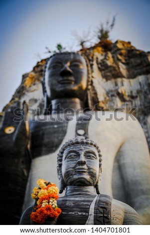 Buddha statue carved from rocky mountains, named PUSHAYAKIRI.