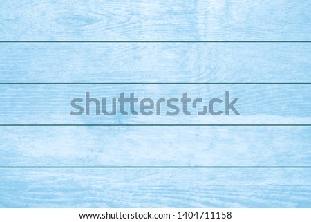 
Texture of White Blue wood plank can be use for background. The white wood background is on top view of natural wooden from the forest show texture of original wooden.