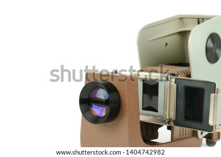 Vintage filmstrip projector isolated on white background. Old projector for displaying of slides. Free space for text.