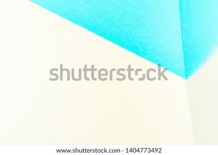 Yellow-green background with a mirror reflection. Abstract image with pastel colors. Summer concept.
