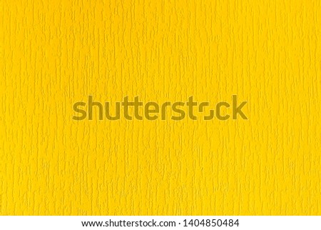 Yellow textured background with small vertical stripes. Front view