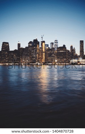 New York City at dusk, color toned picture, New York City, USA.