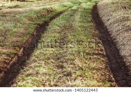 track on a muddy road