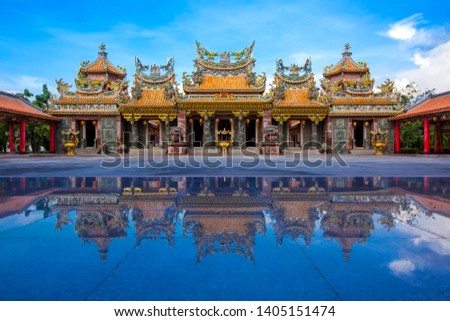 The Chinese temple, day at beautiful sky and 
Reflection. located in At Bang Pu, Samut Prakan Province, Thailand