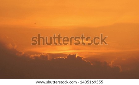 Silhouette sunset with orange sky at dusk for background backdrop 