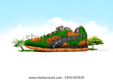 Running shoes running in nature. Shoe manipulation consisting of grass and soil. Royalty-Free Stock Photo #1405185839