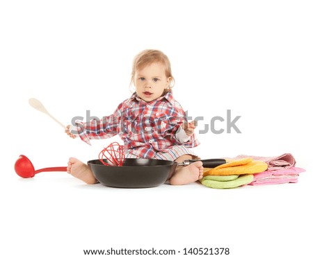 bright picture of adorable baby cook with pan.