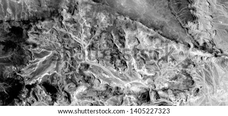 Energy, allegory, abstract photography of the deserts of Africa from the air in black and white,  Genre: Abstract Naturalism, from the abstract to the figurative, 