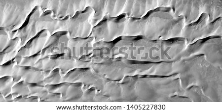 wind painting, allegory, abstract naturalism, Black and white photo, abstract photography of landscapes of the deserts of Africa from the air, aerial view, contemporary photographic art,