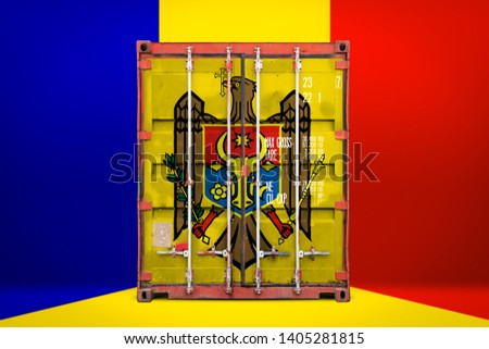  The concept of  Moldavia export-import, container transporting and national delivery of goods. The transporting container with the national flag of Moldavia, view front