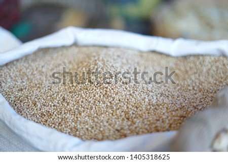Sack of Coriander seeds for sale at traditional vegetable market