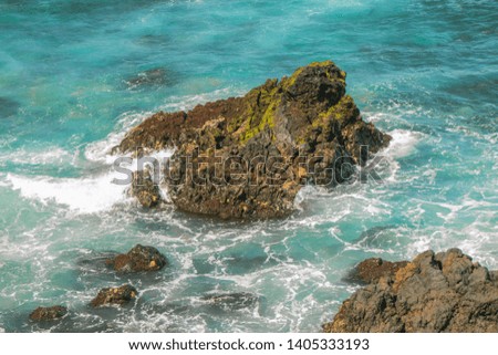 Ocean landscape, seawater with waves, rocks in the Canary Islands