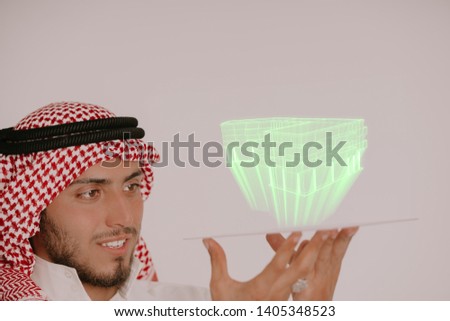 muslim arab man using new modern hologram technology