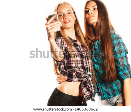 cute teenage girls making selfie isolated