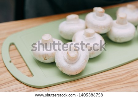 Mushrooms mushroom on a chopping board
