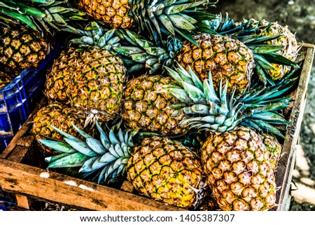 pineapples at the market, photo as a background, digital image