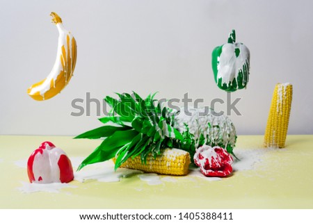 Suspended vegetable display covered in white wax