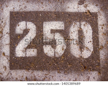 the numbers on the pavement 250