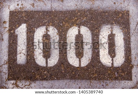 the numbers on the pavement 1000
