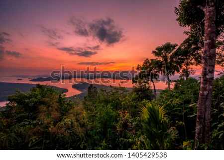 The natural background of the secret light of the evening sky on the panoramic viewpoint, can see the surrounding atmosphere (mountains, rivers, trees) and the wind blowing through the cool.