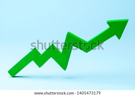 Chart with green up arrow on blue background. Growth in business