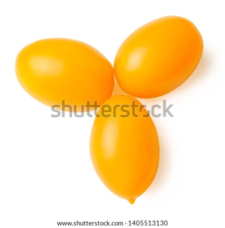 Three yellow tomatoes isolated on white. Close-up. View from above. Design element for print and web.