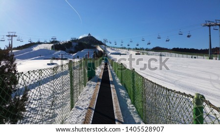 This picture is a picture of a ski resort in winter.