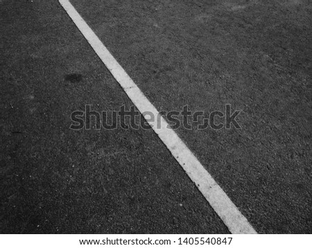 Asphalt road with white stripes, abstract asphalt background