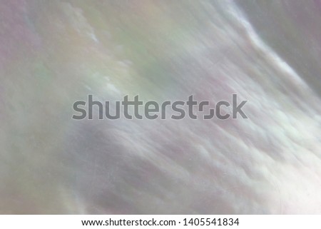 Abstract pearl background with shiny shimmering nacreous mother of pearl colours Royalty-Free Stock Photo #1405541834