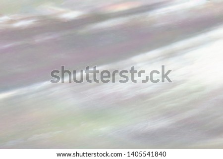 Abstract pearl background with shiny shimmering nacreous mother of pearl mauve and turquoise colours Royalty-Free Stock Photo #1405541840