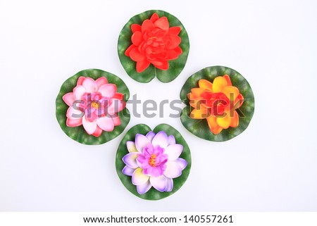 color artificial Lotus on white back ground. Hand made modern Thai art