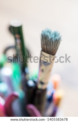 Artist paint brush on creative background. Painting therapy.