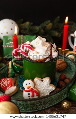 Hot chocolate with marshmallows and cookies for a merry Christmas