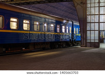 Passenger train at the night station