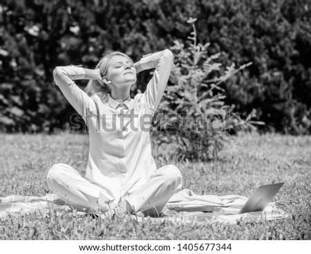 Girl meditate on rug green grass meadow nature background. Woman relaxing practicing meditation. Every day meditation. Reasons you should meditate every day. Clear your mind. Find minute to relax.