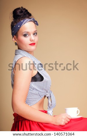  Beautiful Girl Drinking Tea or Coffee. Cup of Hot Beverage brown background