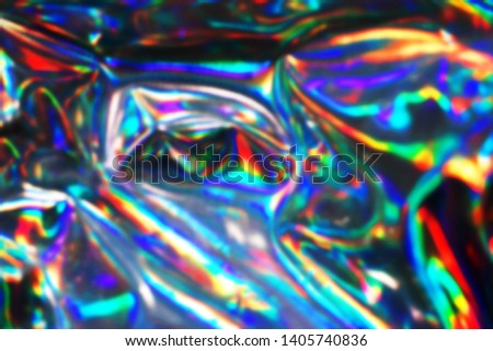 Holographic iridescent abstract blurred surface. Holographic gradient background.