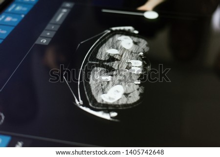 Doctor examines human organs on a touch screen. Education of medical university students